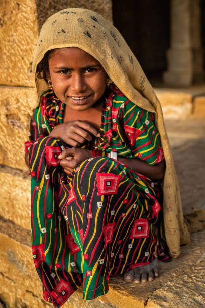 istock Poor Indian girl asking for help 2185719570