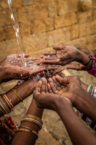 istock Poor Indian children asking for fresh water, India 2185719855