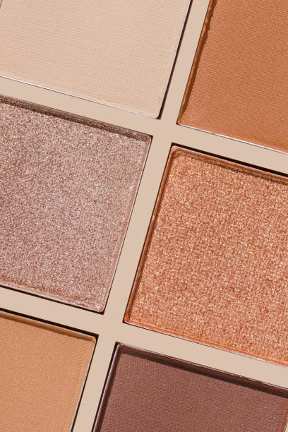 istock Swatches eyeshadow refills as minimal graphic pattern. Matte and glitter pans beige brown copper shade, detailed texture, sun light, minimal trend cosmetics background, beauty product, eye makeup 2185721356