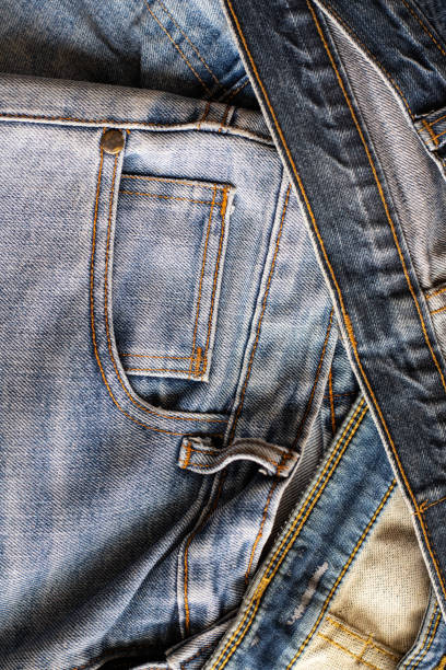 istock pile of blue denim jeans 2185724831