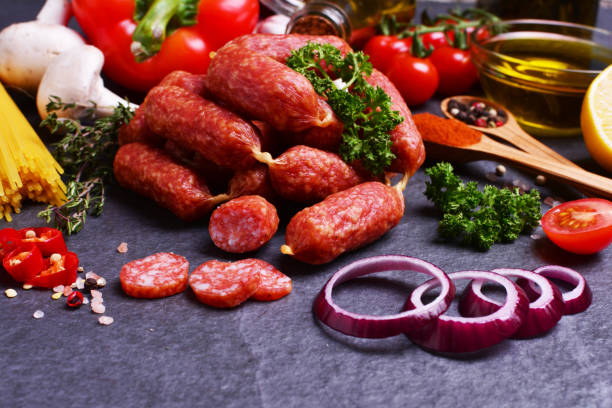 istock Sausage with salami with spices and vegetables 2185725536