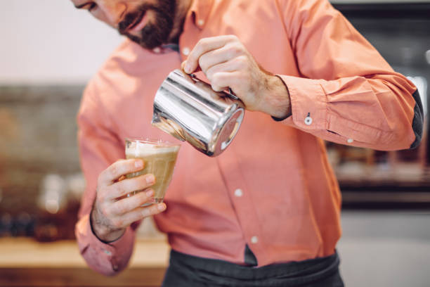 istock Barista is working in a coffee shop 2185726482