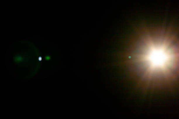 istock Sun flare on the black background 2185726931