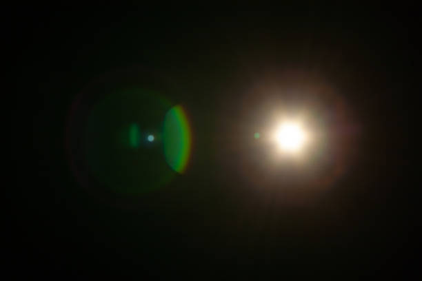 istock Sun flare on the black background 2185726974