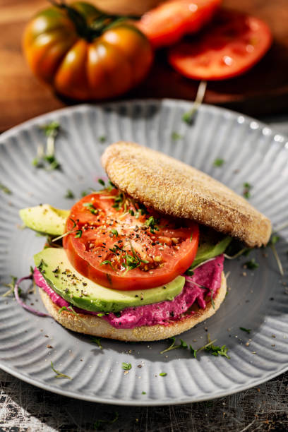 istock English Muffin with Avocado and Beetroot Hummus 2185727716