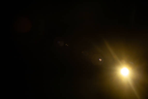 istock Sun flare on the black background 2185729203