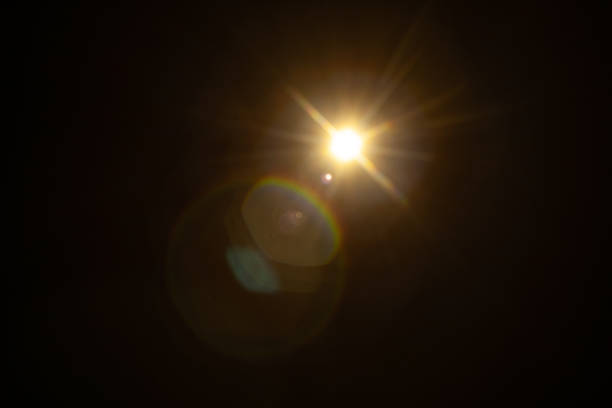 istock Sun flare on the black background 2185729346