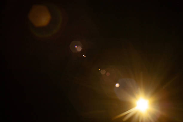 istock Sun flare on the black background 2185729409