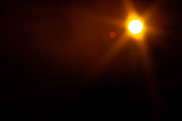 istock Sun flare on the black background 2185730958
