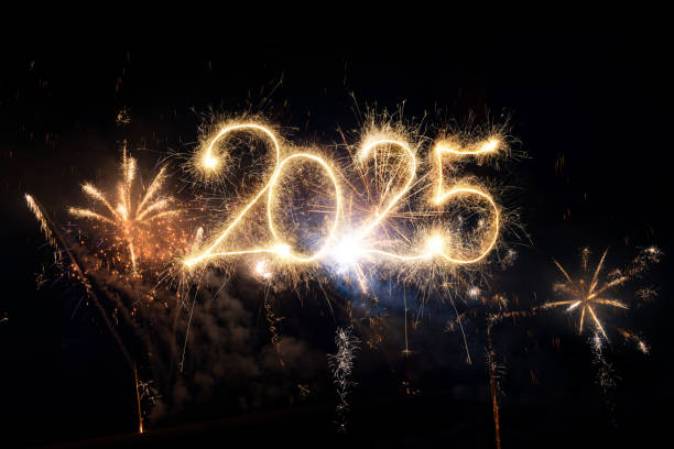 istock Sparkler Happy New Year 2025 with fireworks 2185736877