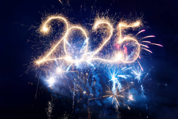 istock Sparkler Happy New Year 2025 with fireworks 2185737254