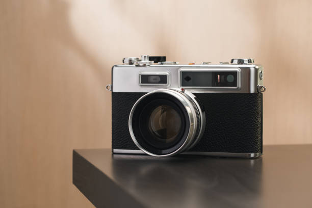 istock A vintage film camera sits elegantly on a table, showcasing timeless craftsmanship. 2185750487