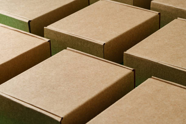 istock A close view of multiple brown cardboard boxes stacked closely in a warehouse 2185753369