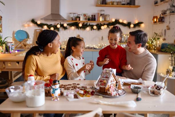 istock Happy family having fun in the kitchen 2185754910