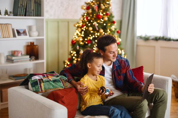 istock Family talking on a video call during Christmas 2185754989