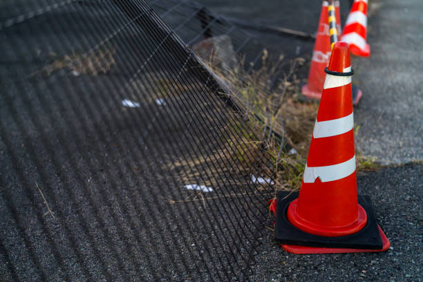 istock Red TRAFFIC CONE and collapsed fences, SAFETY CONE, 2185766292