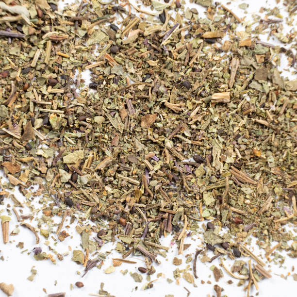 istock Dry basil spice seasoning macro texture on white background. 2185766617