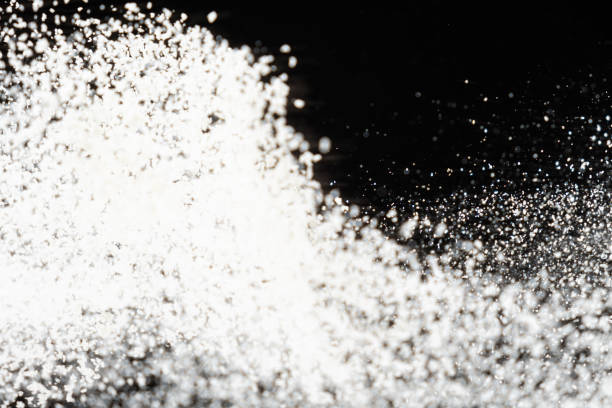 istock Abstract black and white background of pouring flour, space for text 2185766735