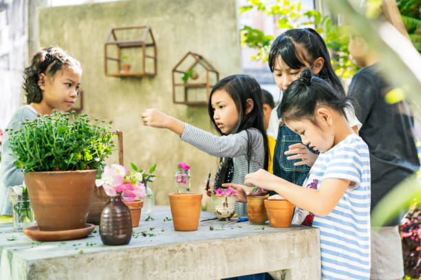 istock student and friends learning in the school, Primary Education 2185776105