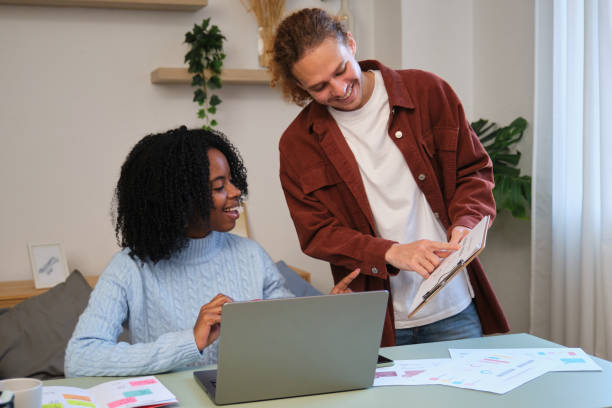 istock Young colleagues collaborating on a project at home office 2185778118