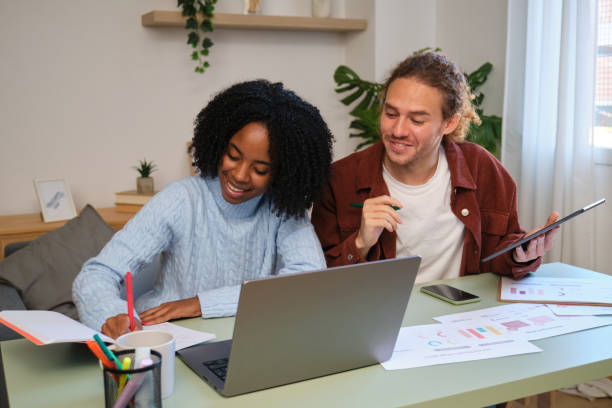 istock Young colleagues collaborating on a project at home office 2185778459