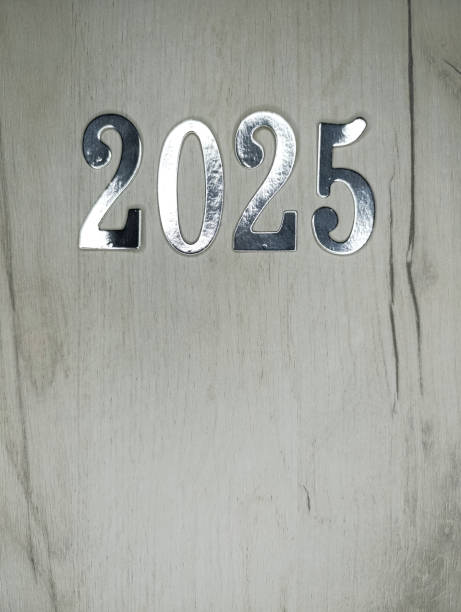 istock New year 2025 silver numbers on gray wooden background 2185779627