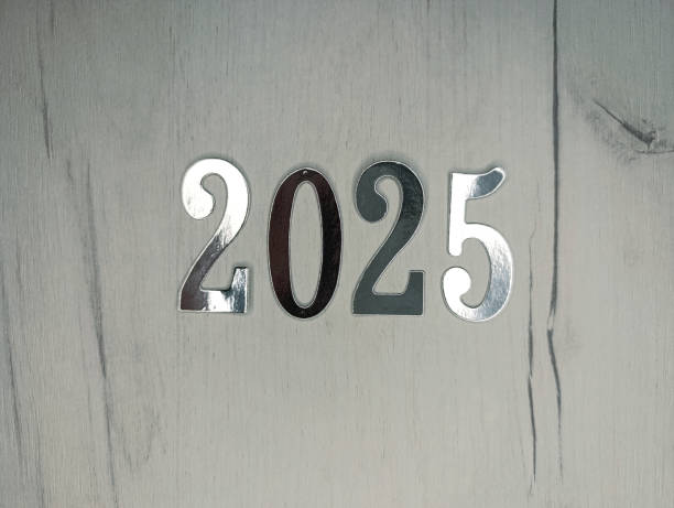 istock New year 2025 silver numbers on gray wooden background 2185779662