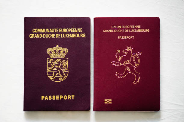 istock New and old Luxembourg passports on a table, copy space 2185781502
