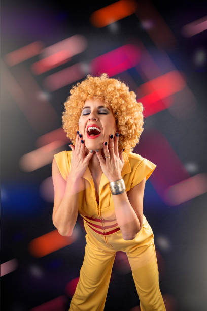 istock 70s Disco Woman Singing With Lights All Around 2185784872