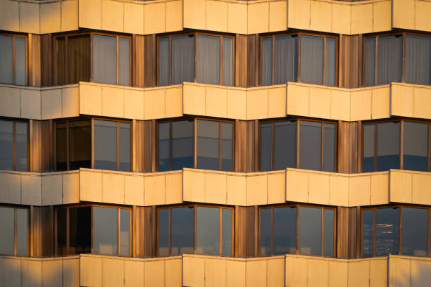 Geometric visual pattern of the windows of a building at sunset