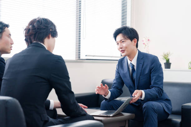 istock Businessman in a suit having a business meeting with a client 2185789055