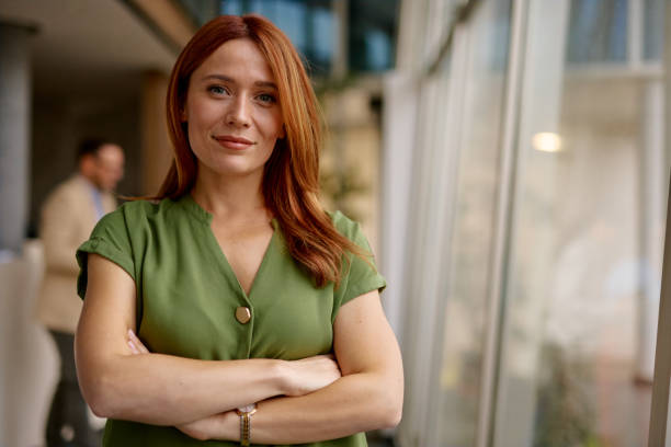 istock Confident Woman in a Modern Office Setting 2185791196