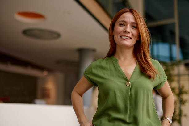 istock Confident Woman in a Modern Office Setting 2185791214