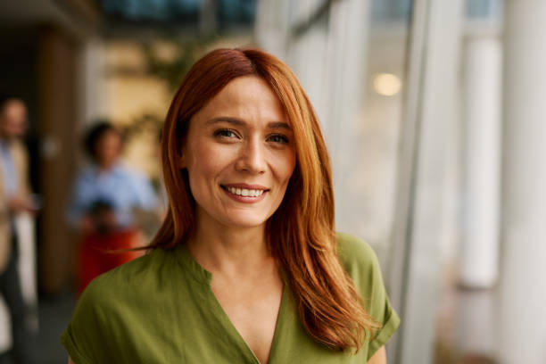 istock Confident Woman in a Modern Office Setting 2185791315