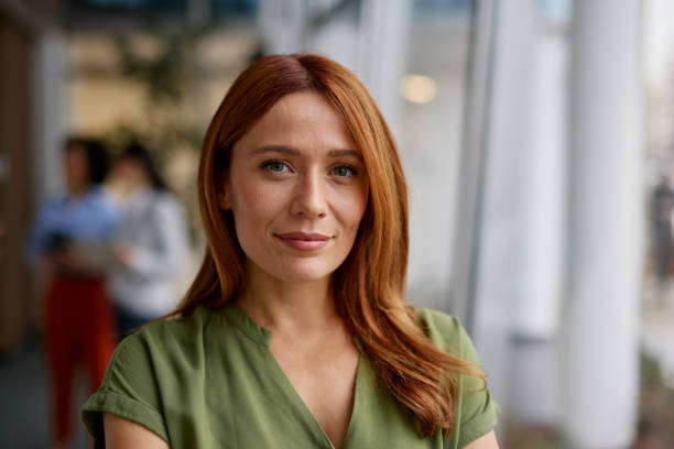 istock Confident Woman in a Modern Office Setting 2185791316
