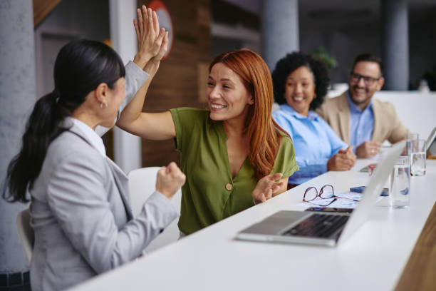 istock Diverse Group Celebrating a Successful Business Achievement Together 2185791680