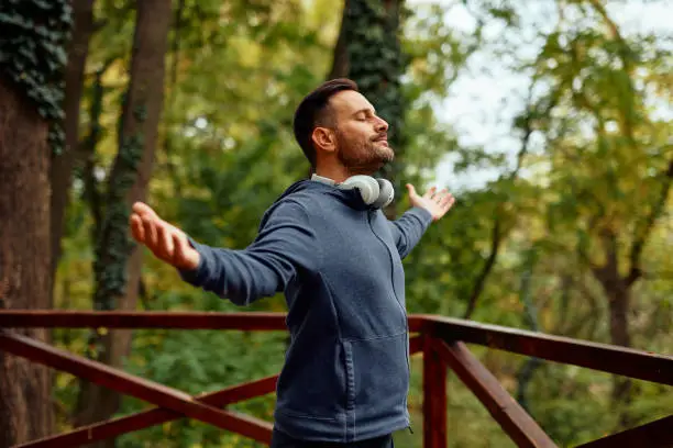 Portrait of a mid adult man breathing fresh air Portrait of a mid adult man breathing fresh air