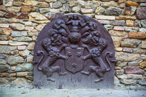 istock Old cast iron plaque with coat of arms 2185791743