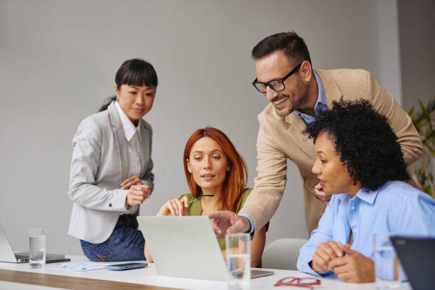 istock Diverse Business Team Collaborating on a Project in Modern Office 2185791856