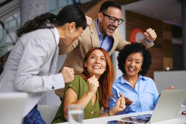 istock Diverse Team Celebrating Success Over a Project Achievement 2185791915