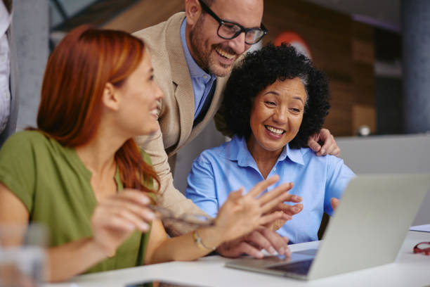 istock Diverse Business Team Collaborating on a Project in Modern Office 2185791938