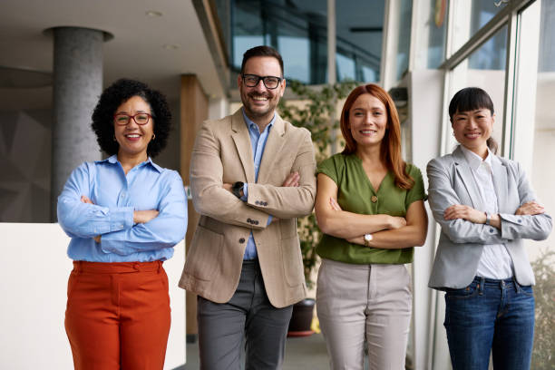 istock Diverse Business Team Standing Confidently in Modern Office 2185791947