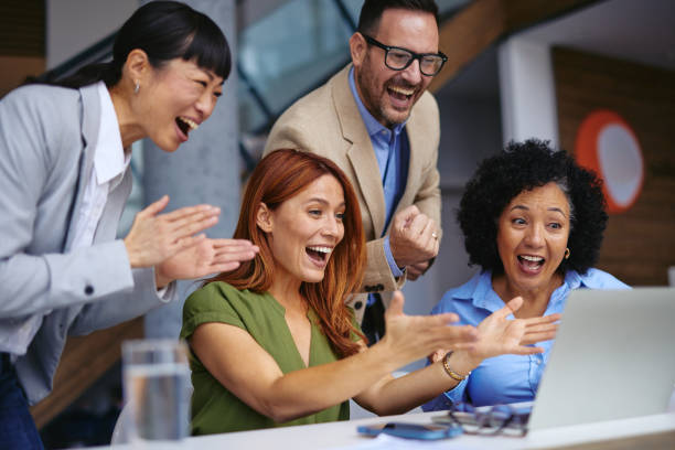 istock Diverse Team Celebrating Success Over a Project Achievement 2185791958