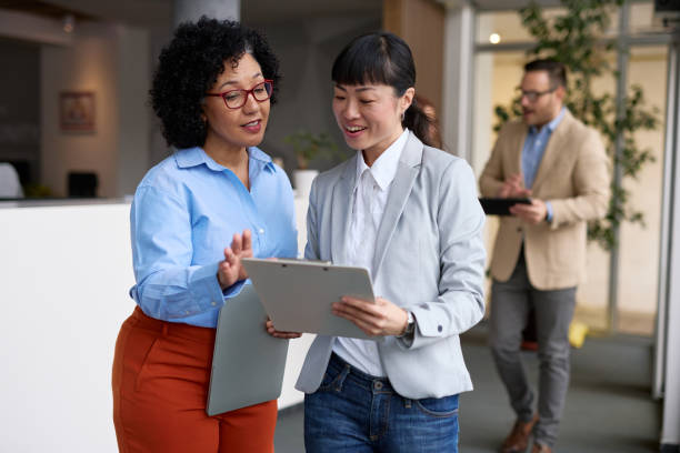 istock Business Colleagues Collaborating in Modern Office Environment 2185791964
