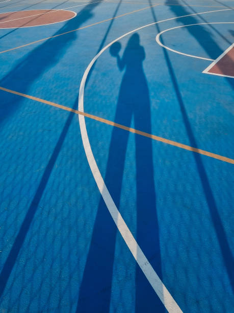 istock woman playing basketball 2185795826