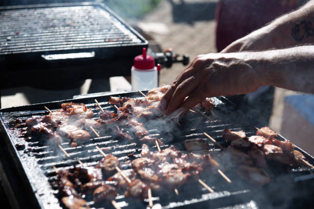 istock cook making grilled octopus on the street 2185799849