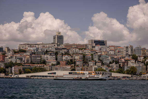 istock Urban hillside packed with vibrant buildings and water. 2185803603