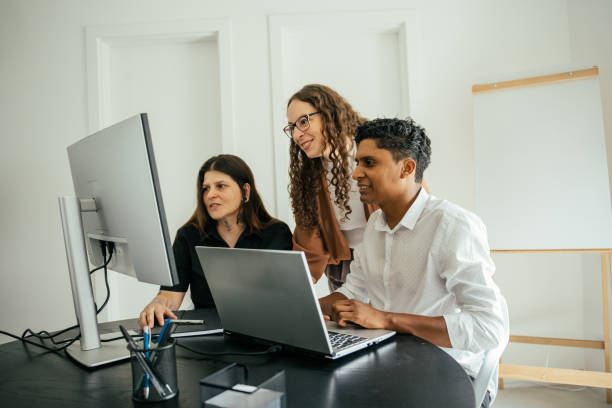 istock Employees in a project meeting in a modern office 2185803629