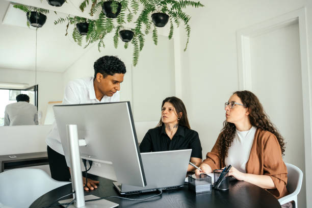 istock Employees in a project meeting in a modern office 2185803650