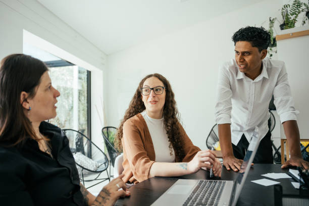 istock Employees in a project meeting in a modern office 2185803691